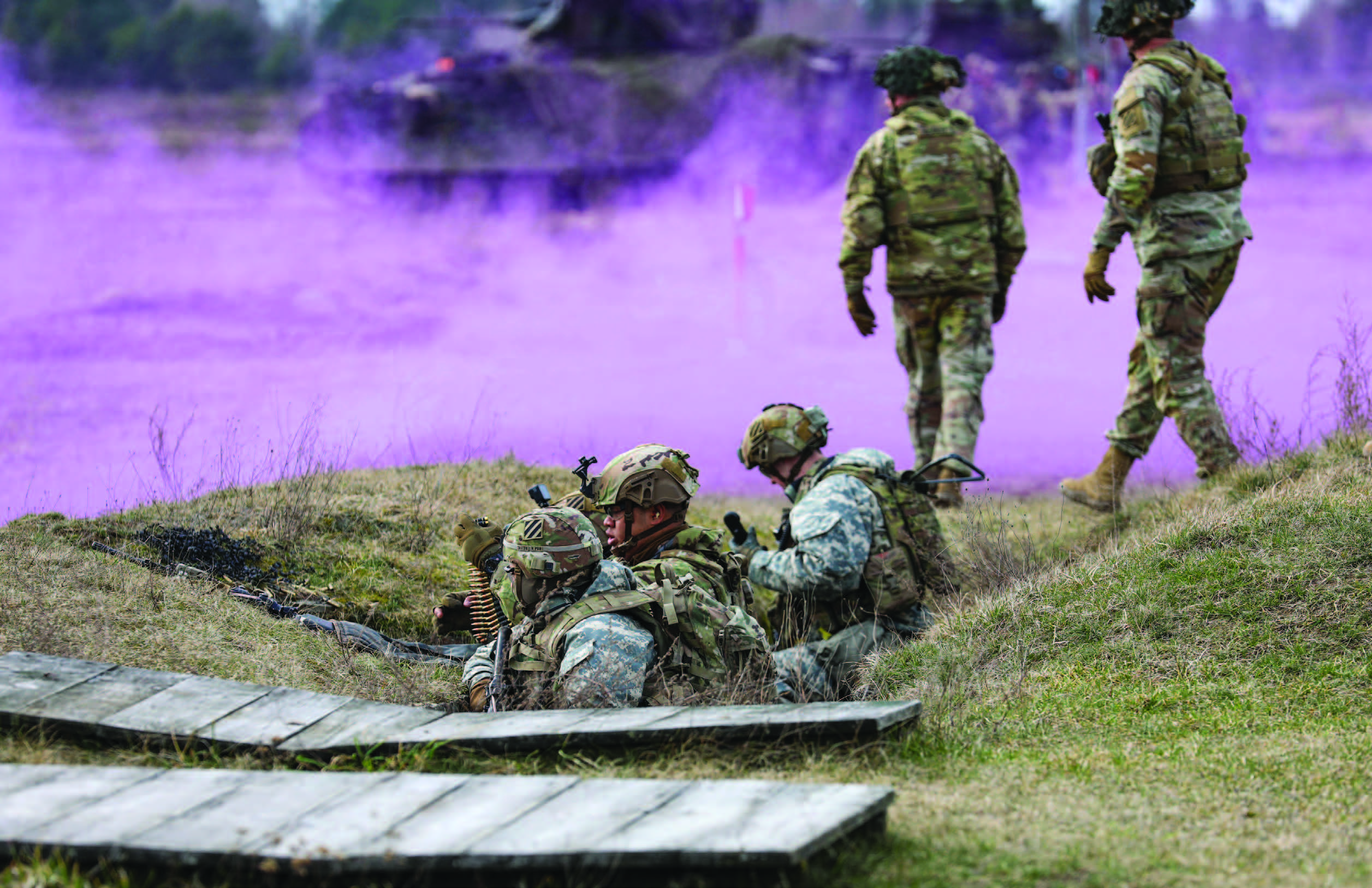 U.S. Army Soldiers with Charlie Company, 3rd Battalion, 15th Infantry Regiment, 2nd Armored Brigade Combat Team, 3rd Infantry Division, with
NATO’s enhanced Forward Presence Battle Group Poland, provide security for forward dismounted assault unit during NATO training event
Dragon 24, held at Bemowo Piskie Training Area, Poland, March 11, 2024 (U.S. Army/Brett Thompson)